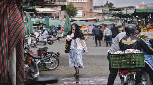 a tourists walks at the Jamaa El Fna place on March 16, 2020 in the city of Marrakesh