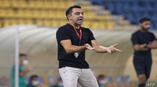 Qatari football club al-Sadd SC's Spanish coach Xavi Hernandez reacts during Qatar Stars League match between al-Sadd SC and al-Duhail SC, at Thani Bin Jassim Stadium (Al-Gharafah Stadium) in Qatar's capital Doha on November 3, 2021. (Photo by KARIM JAAFAR / AFP)